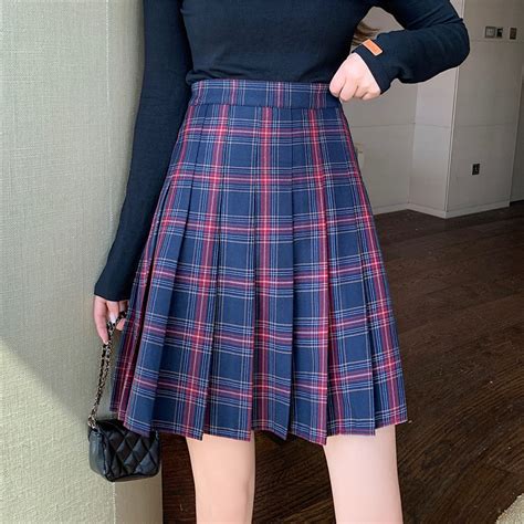 heavy pleated plaid skirts.